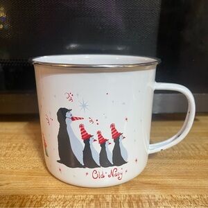 World Market Red Penguins Holiday Enameled Steel Mug. With text Old Navy
